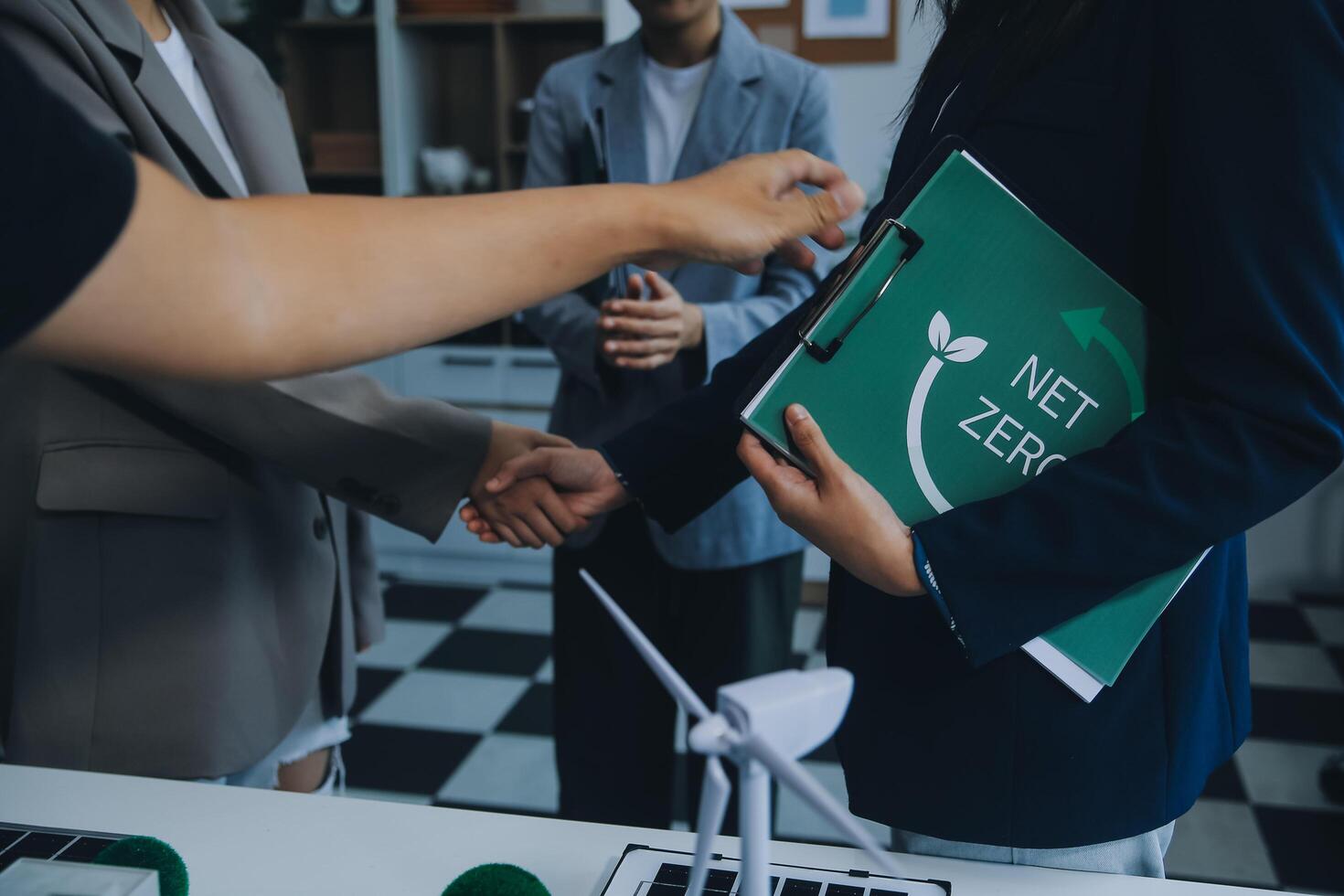 Carbon offset price report CO2 emission. Future growth Net zero waste in ESG ethical SME office protect climate change global warming social issues project. Group of asia people Eco friendly SDGs plan photo