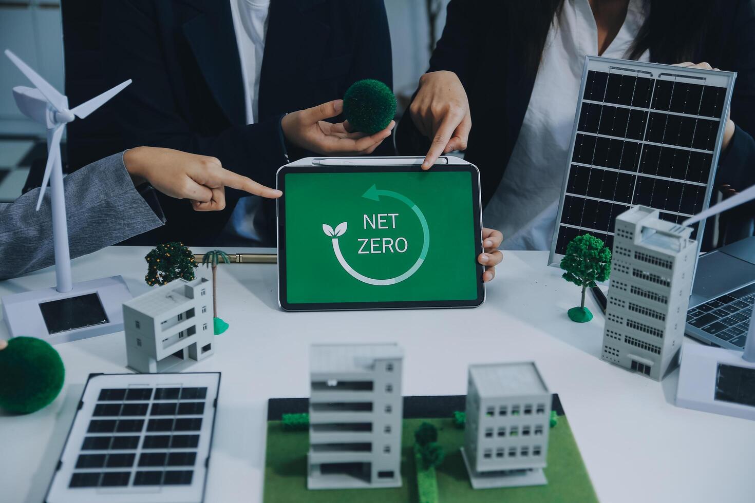 Carbon offset price report CO2 emission. Future growth Net zero waste in ESG ethical SME office protect climate change global warming social issues project. Group of asia people Eco friendly SDGs plan photo
