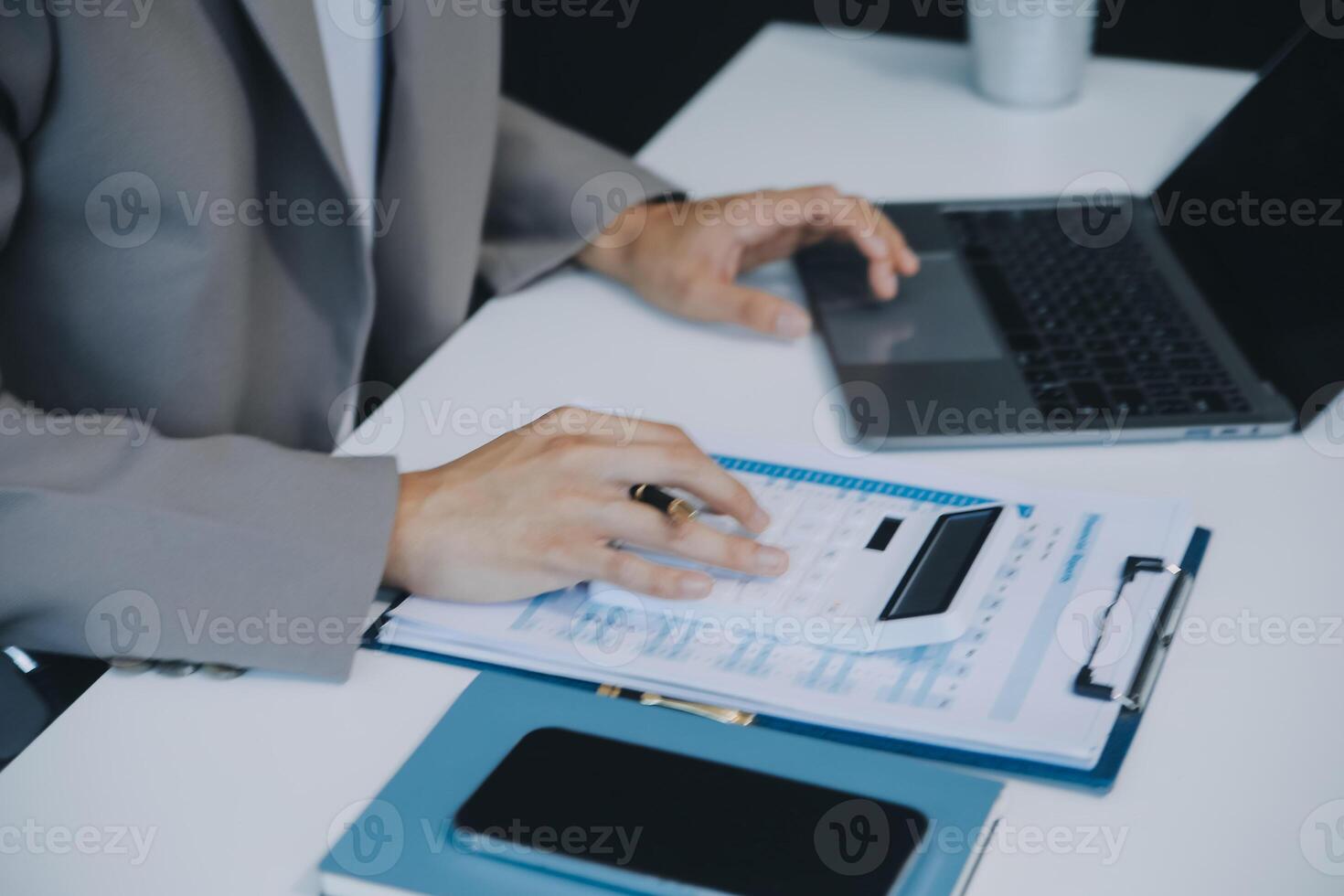 Business Documents, Auditor businesswoman checking searching document legal prepare paperwork or report for analysis TAX time,accountant Documents data contract partner deal in workplace office photo