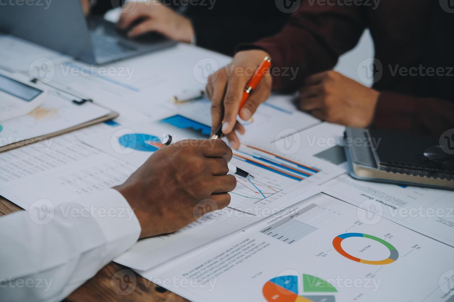 Business team collaboration discussing working analyzing with financial data and marketing growth report graph in team, presentation and brainstorming to strategy planning making profit of company. photo