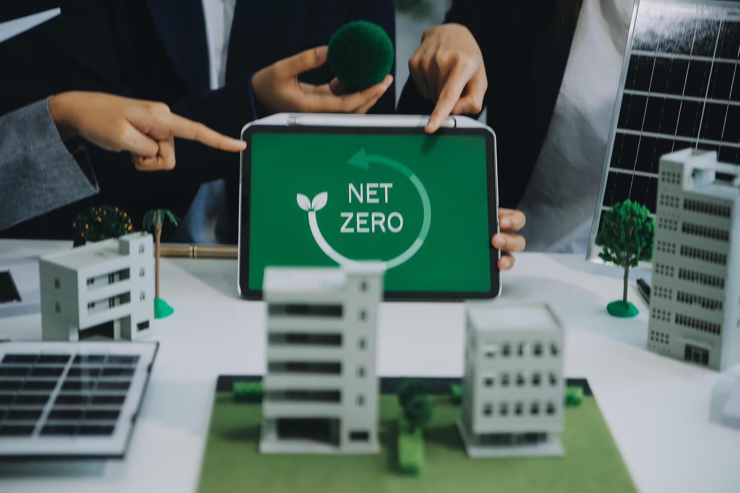 Carbon offset price report CO2 emission. Future growth Net zero waste in ESG ethical SME office protect climate change global warming social issues project. Group of asia people Eco friendly SDGs plan photo