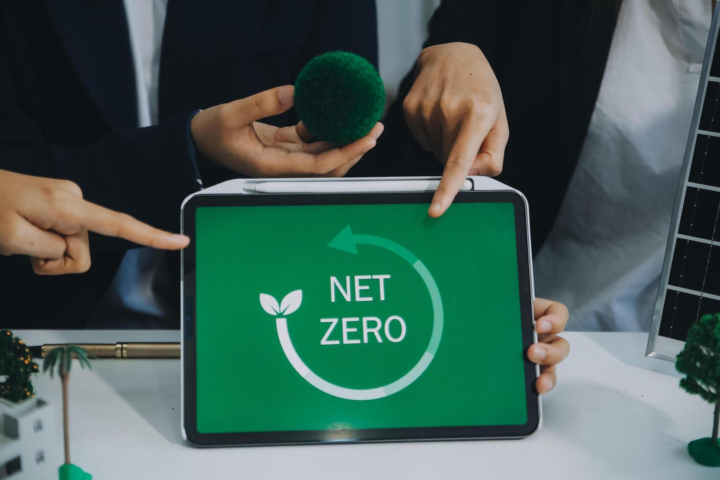 Carbon offset price report CO2 emission. Future growth Net zero waste in ESG ethical SME office protect climate change global warming social issues project. Group of asia people Eco friendly SDGs plan photo