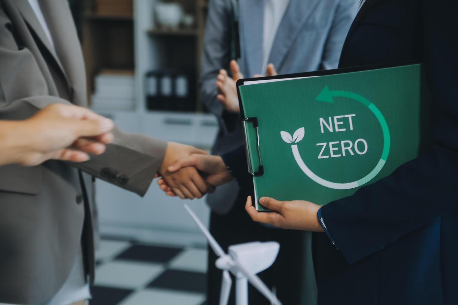 Carbon offset price report CO2 emission. Future growth Net zero waste in ESG ethical SME office protect climate change global warming social issues project. Group of asia people Eco friendly SDGs plan photo