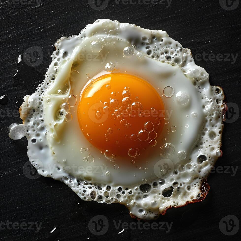 AI generated Egg yolk isolated on background. Egg top view. Omlet. Fried egg as breakfast food photo