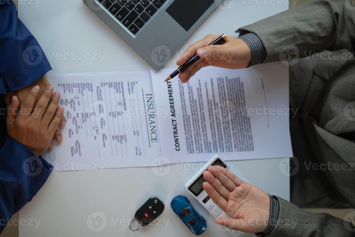 Car dealers recommend car to customers before entering into sales contracts so that customers can get the car they like before paying contract money. Concept of making sales contract with distributor photo