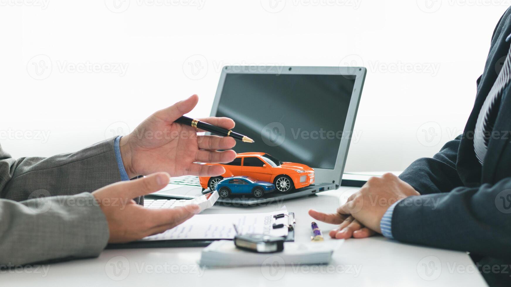 Car dealers recommend car to customers before entering into sales contracts so that customers can get the car they like before paying contract money. Concept of making sales contract with distributor photo