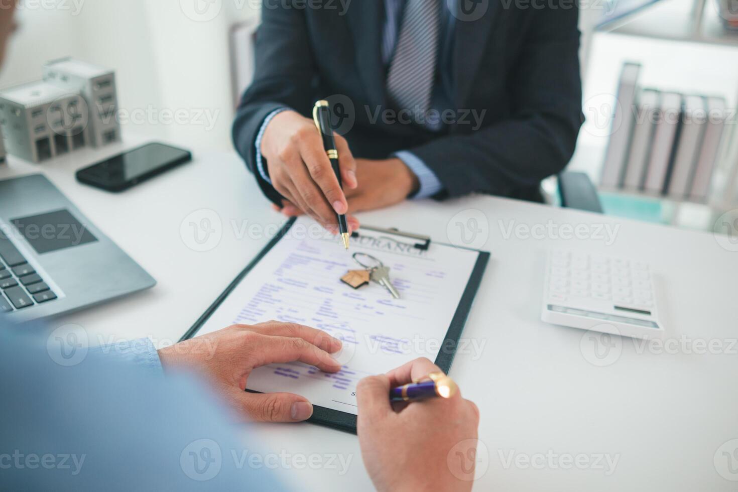 Real estate agents are selling real estate clients and offering condominiums buyers as long term rental investments help reduce burden paying installments. Investment property trading long term rental photo