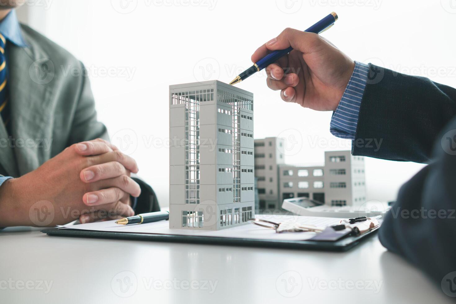 Real estate agents are selling real estate clients and offering condominiums buyers as long term rental investments help reduce burden paying installments. Investment property trading long term rental photo