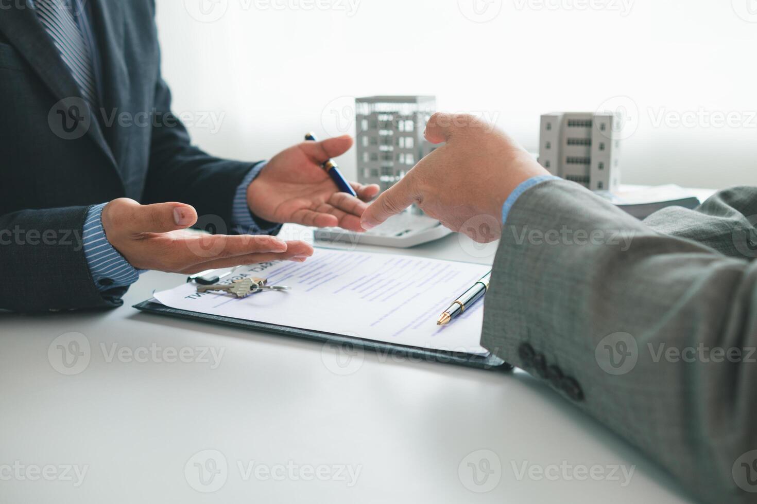 Real estate agents are selling real estate clients and offering condominiums buyers as long term rental investments help reduce burden paying installments. Investment property trading long term rental photo