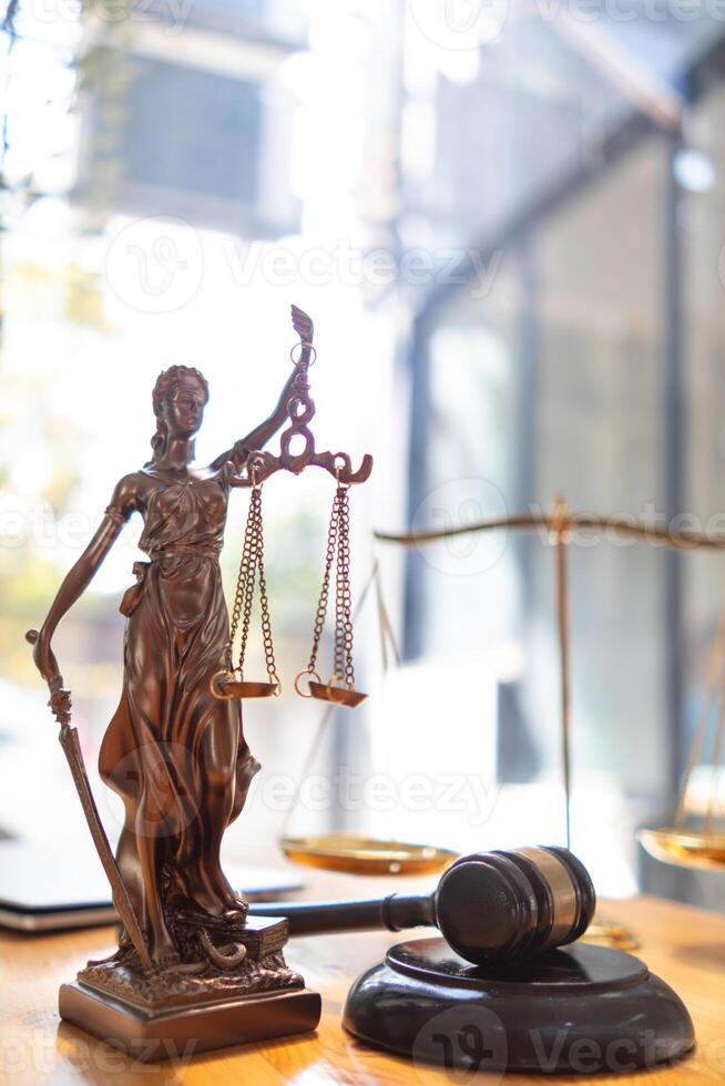 statue of god Themis Lady Justice is used as symbol of justice within law firm demonstrate truthfulness of facts and power to judge without prejudice. hemis Lady Justice symbol of honesty and justice. photo