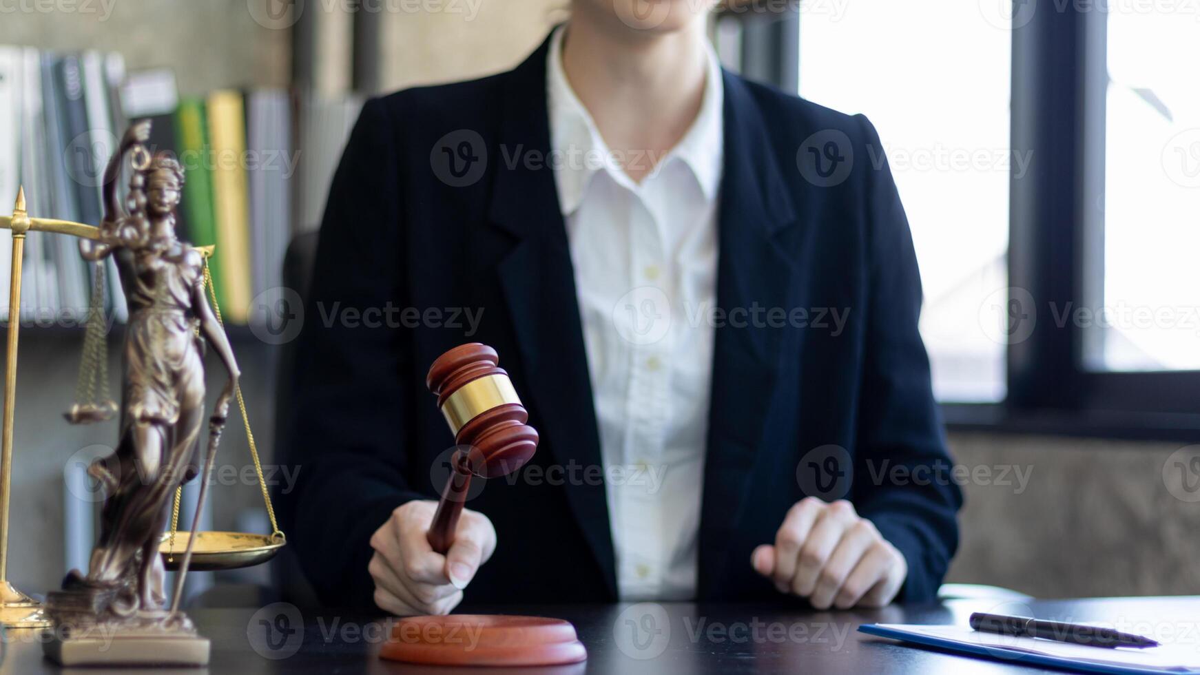 A judge gavel is prepared in the courtroom to be used to give a signal when the verdict is read after the trial is completed. Concept judge gavel is prepared to symbolize the decision in a court case. photo