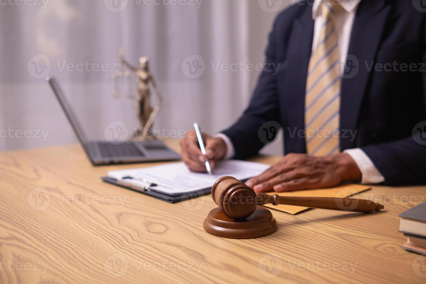 A judge gavel is prepared in the courtroom to be used to give a signal when the verdict is read after the trial is completed. Concept judge gavel is prepared to symbolize the decision in a court case. photo