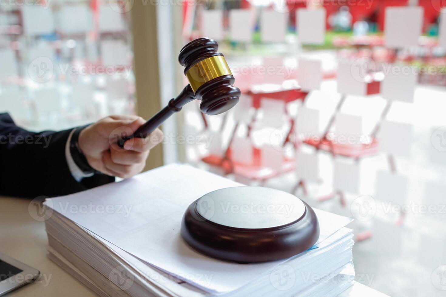 A judge gavel is prepared in the courtroom to be used to give a signal when the verdict is read after the trial is completed. Concept judge gavel is prepared to symbolize the decision in a court case. photo