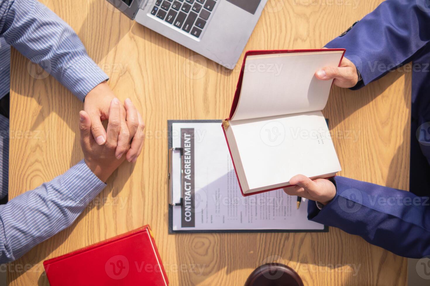 Lawyers are providing legal advice to those seeking legal assistance to understand the rules correctly to prevent unintentional wrongdoing. Concept for seeking legal advice from a team of lawyers photo