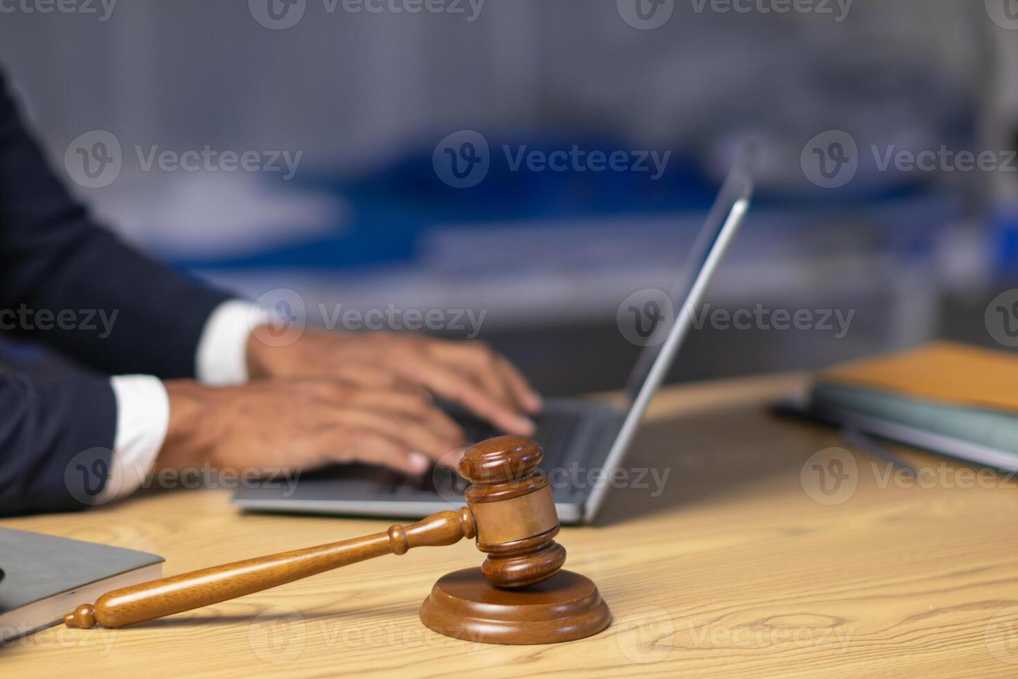 A judge gavel is prepared in the courtroom to be used to give a signal when the verdict is read after the trial is completed. Concept judge gavel is prepared to symbolize the decision in a court case. photo