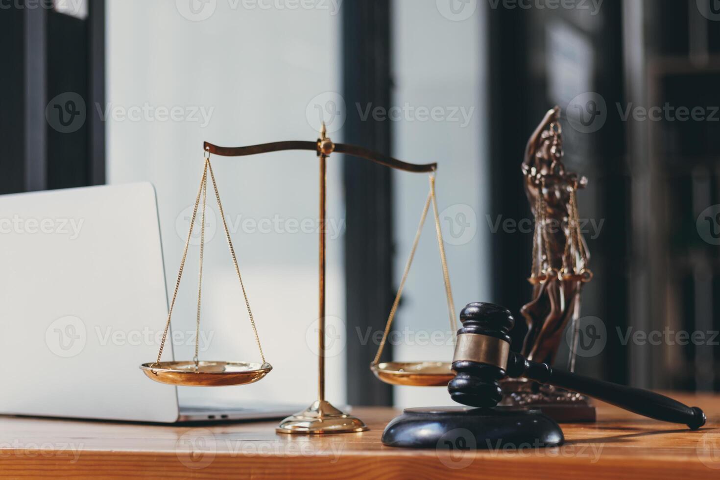 A judge gavel is prepared in the courtroom to be used to give a signal when the verdict is read after the trial is completed. Concept judge gavel is prepared to symbolize the decision in a court case. photo