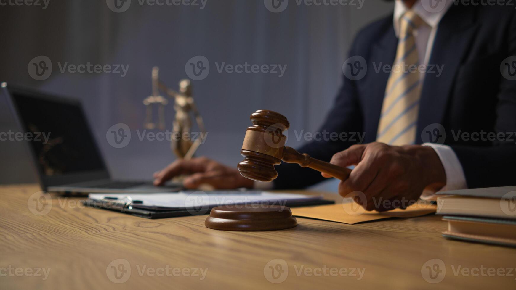 A judge gavel is prepared in the courtroom to be used to give a signal when the verdict is read after the trial is completed. Concept judge gavel is prepared to symbolize the decision in a court case. photo