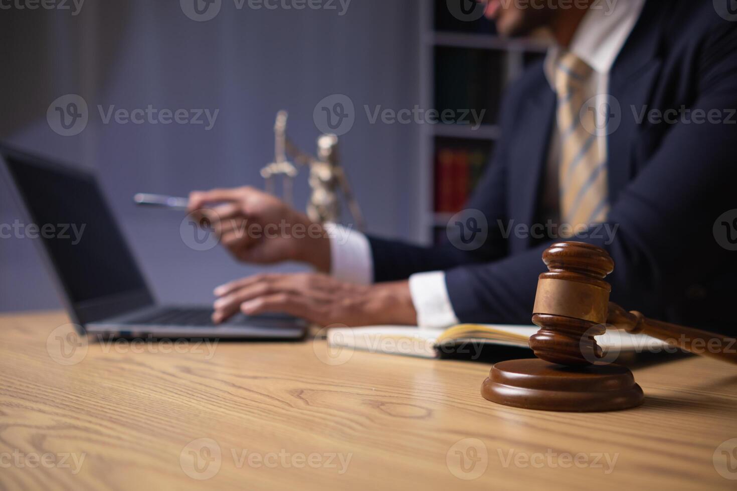 A judge gavel is prepared in the courtroom to be used to give a signal when the verdict is read after the trial is completed. Concept judge gavel is prepared to symbolize the decision in a court case. photo