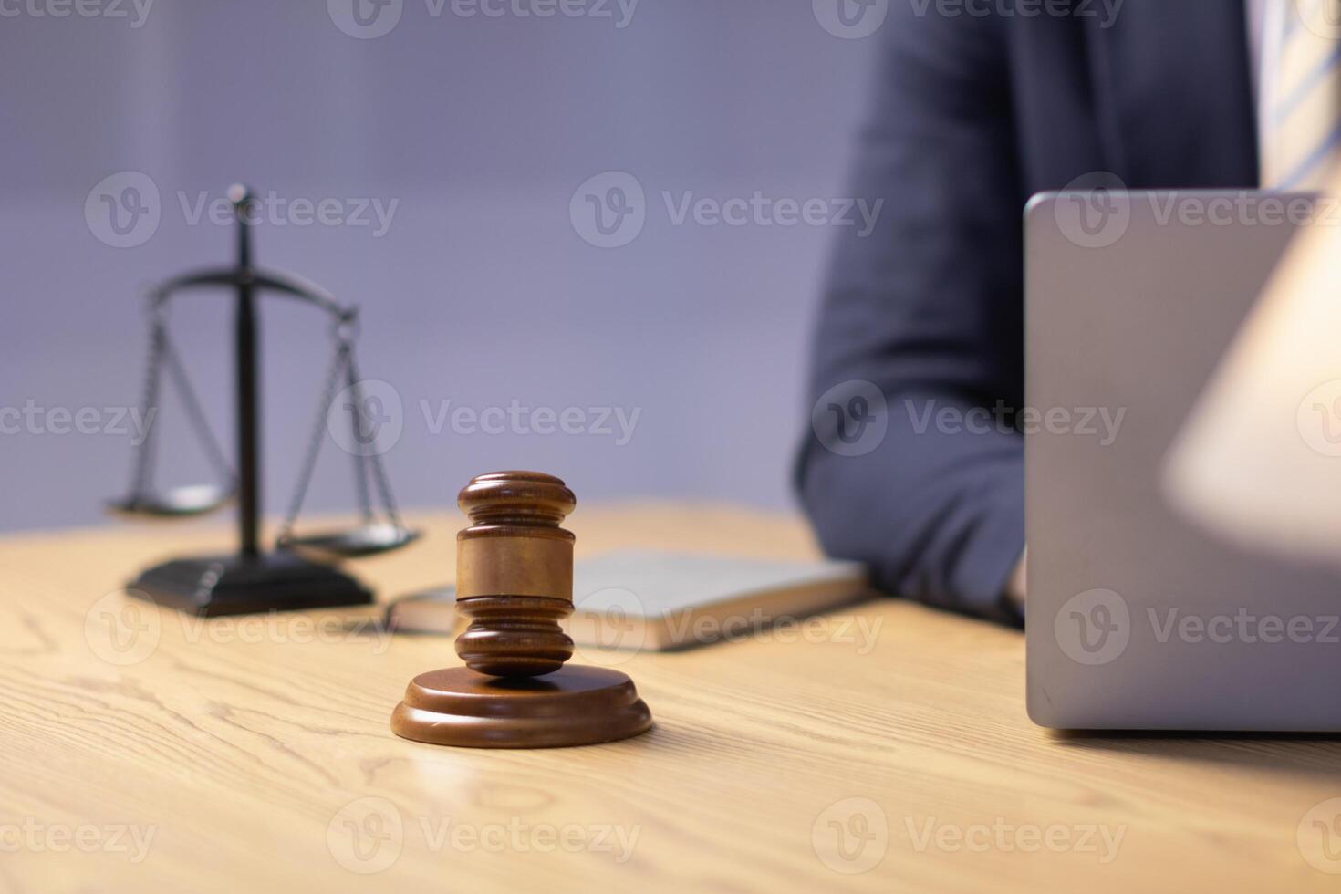 A judge gavel is prepared in the courtroom to be used to give a signal when the verdict is read after the trial is completed. Concept judge gavel is prepared to symbolize the decision in a court case. photo