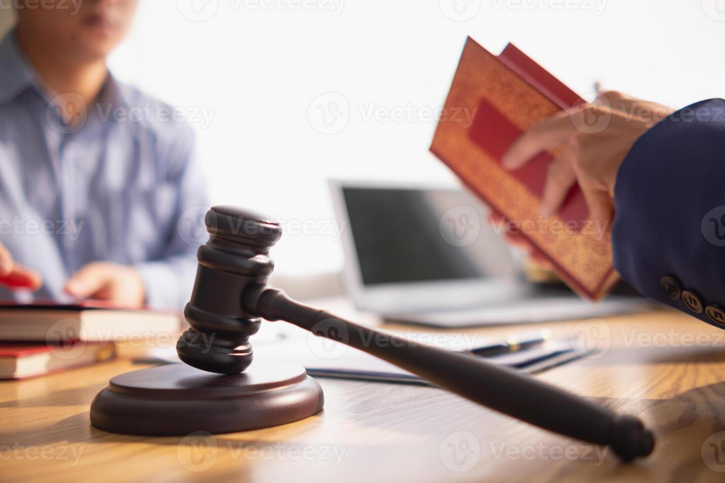 A judge gavel is prepared in the courtroom to be used to give a signal when the verdict is read after the trial is completed. Concept judge gavel is prepared to symbolize the decision in a court case. photo