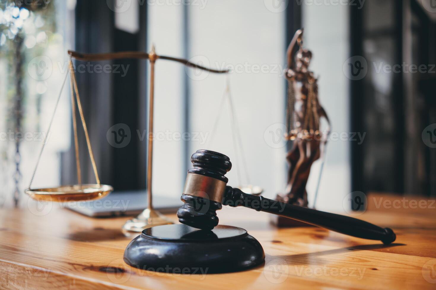 A judge gavel is prepared in the courtroom to be used to give a signal when the verdict is read after the trial is completed. Concept judge gavel is prepared to symbolize the decision in a court case. photo