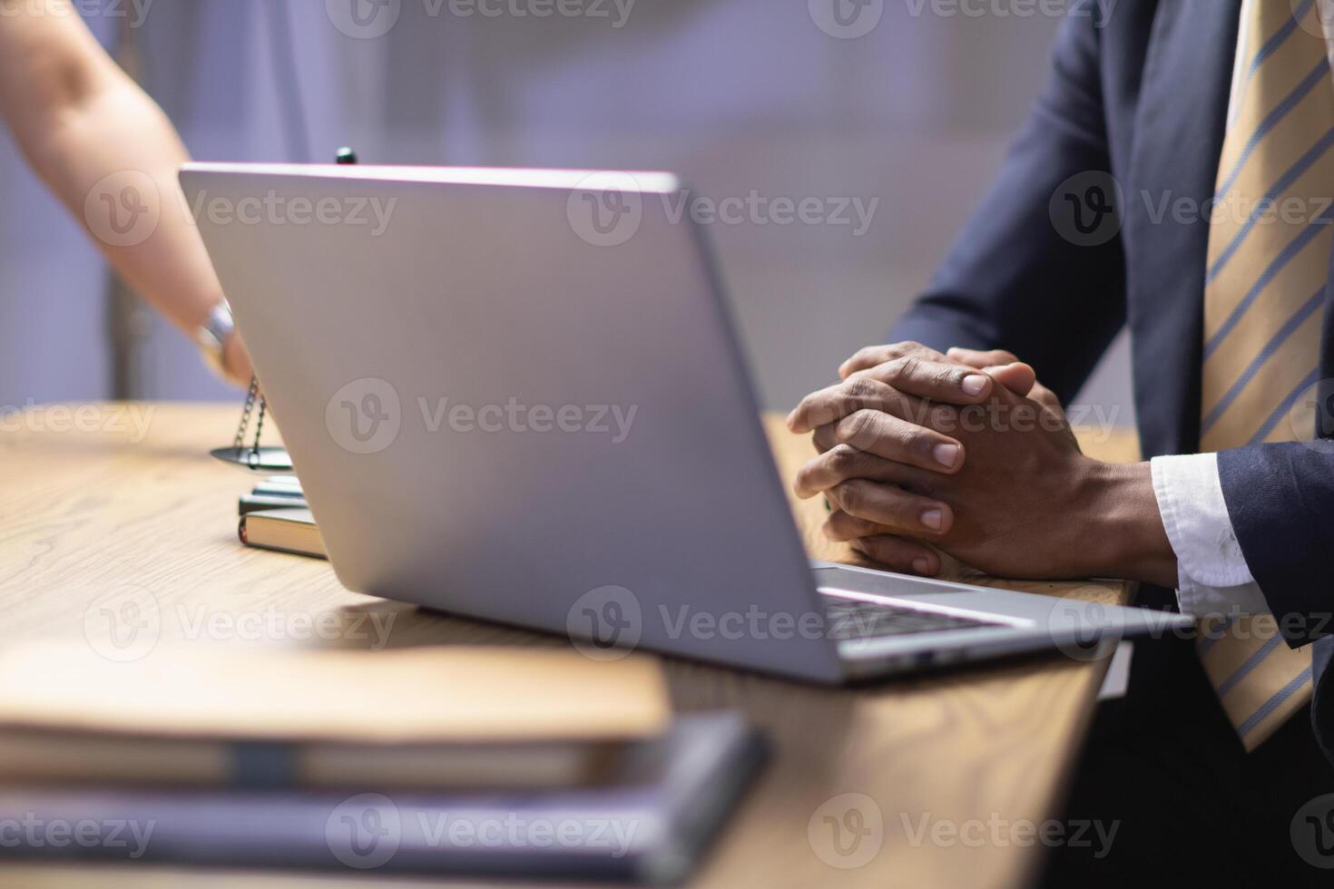 Lawyers are providing legal advice to those seeking legal assistance to understand the rules correctly to prevent unintentional wrongdoing. Concept for seeking legal advice from a team of lawyers photo