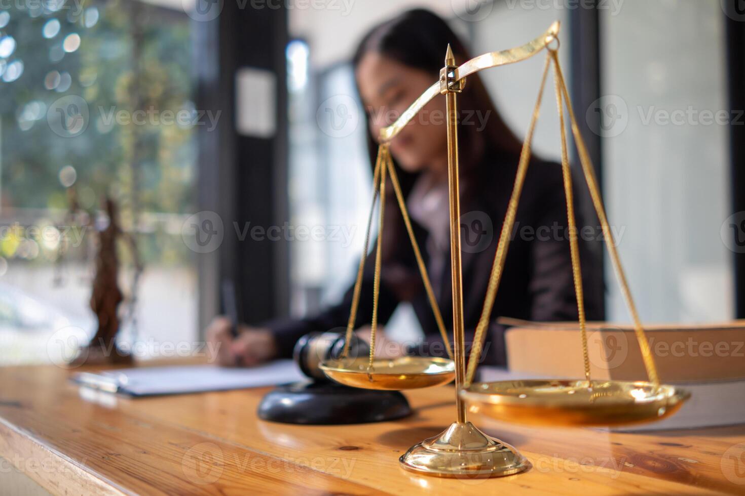 Brass scales are placed on lawyers desks in legal advice offices as a symbol of fairness and integrity in the High Court decision making. Brass scales were used as a symbol of honesty and justice. photo