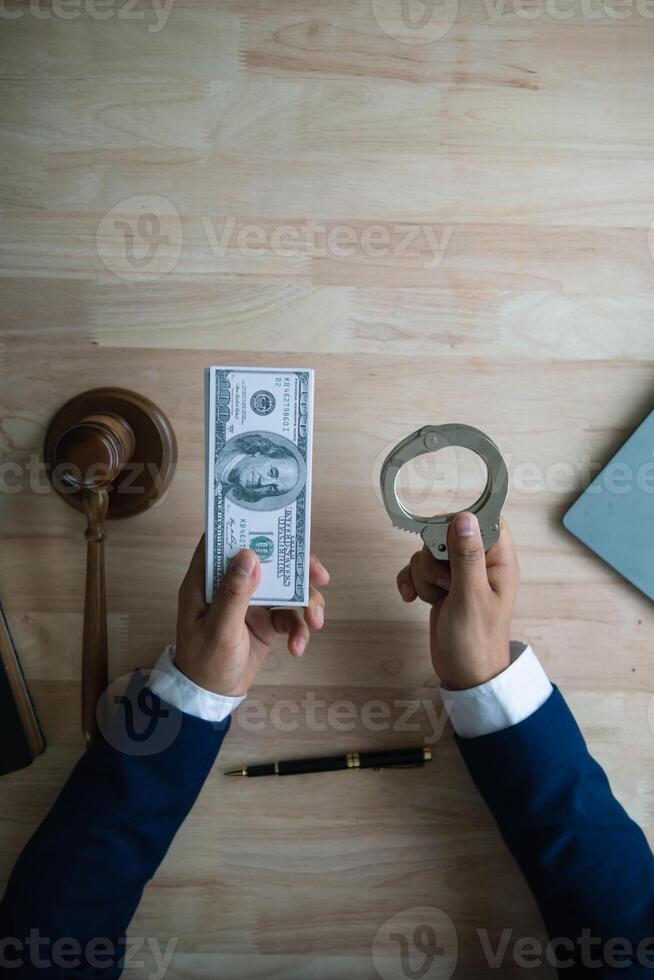 The concept of defendants in serious cases bribing officials involved in court decisions to change the course of case by giving bribes to facilitate the Lawyer team and prosecutors. bribery concept photo