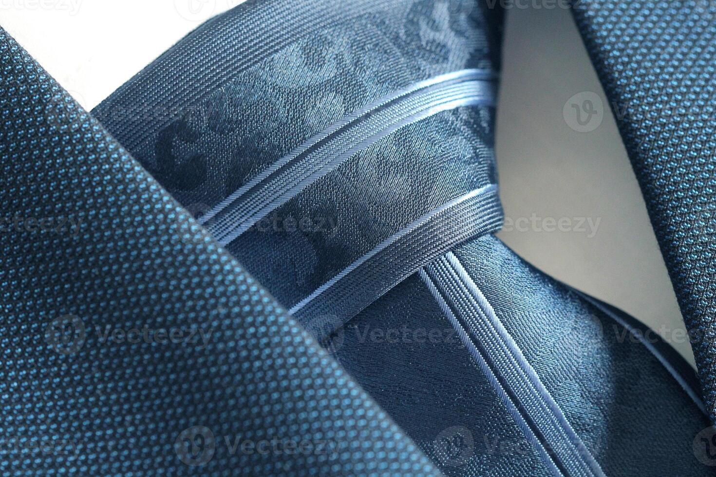 Classic blue suit, shirt and tie, close up, top view photo