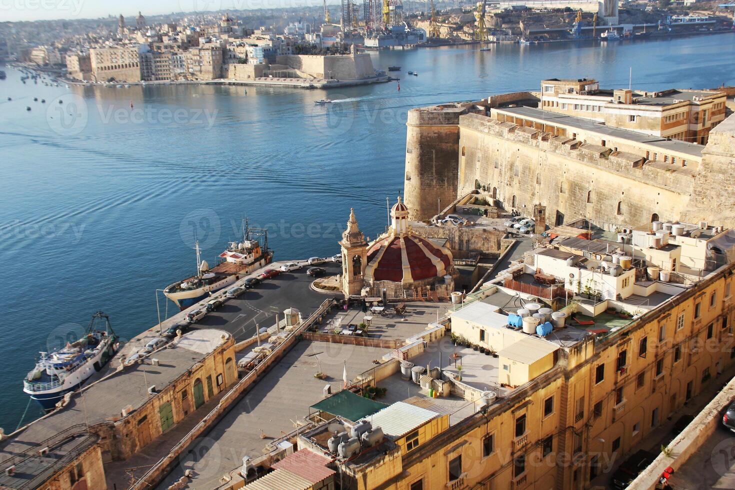 Panoramic skyline view of ancient defences of Valletta, Tree cities and the Grand Harbor, Malta photo