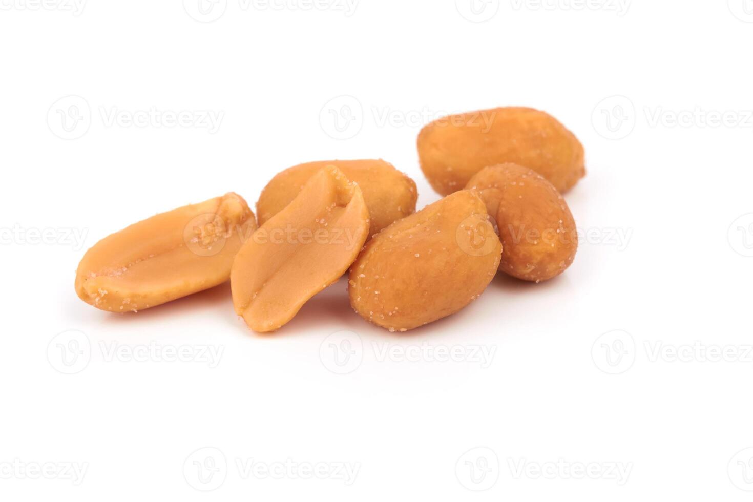salted peanuts on white photo