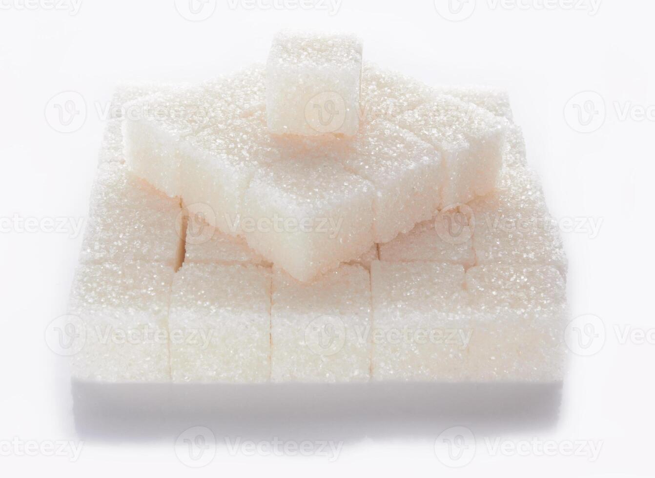 sugar cubes on white photo