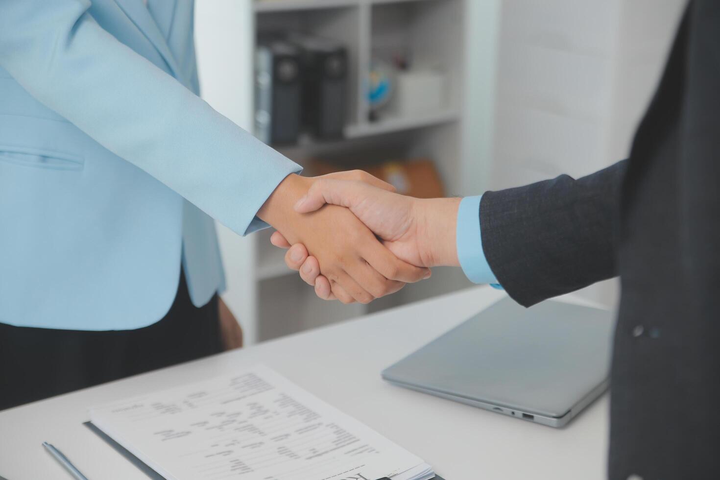 Close up view of job interview in office, focus on resume writing tips, employer reviewing good cv of prepared skilled applicant, recruiter considering application, hr manager making hiring decision photo