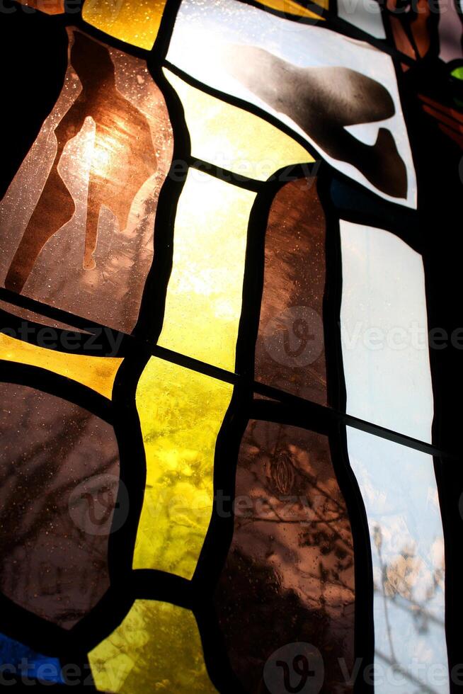 Sunlight Shining Through a Modern Stained Glass Window photo