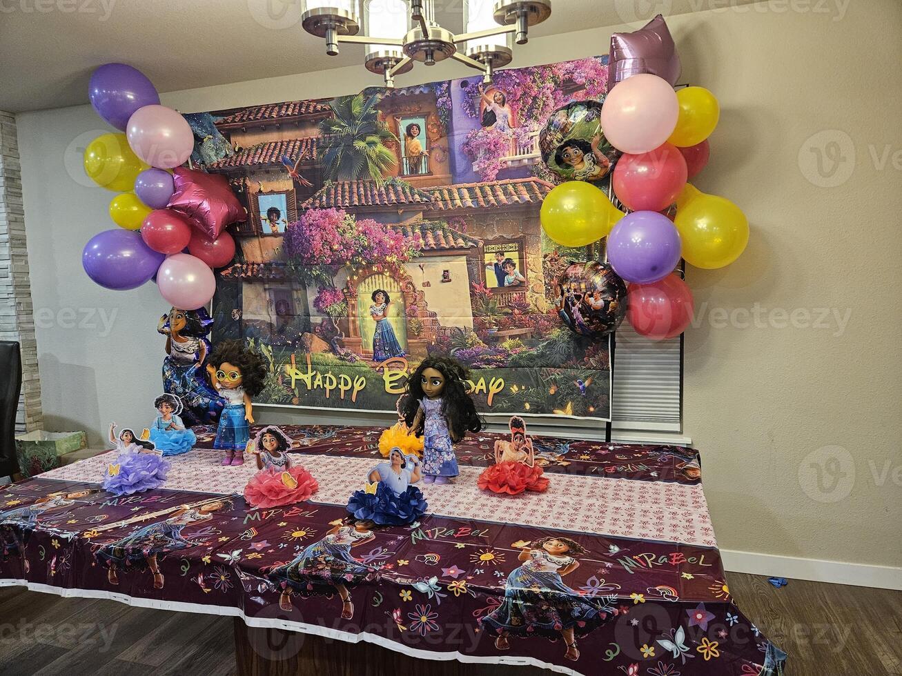 Encanto themed birthday party and birthday cake photo