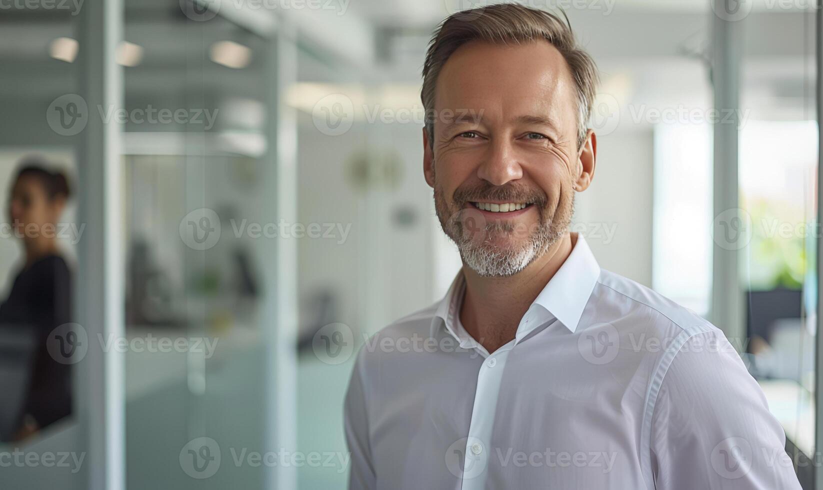 AI generated Smiling confident business leader looking at camera and standing in an office. photo