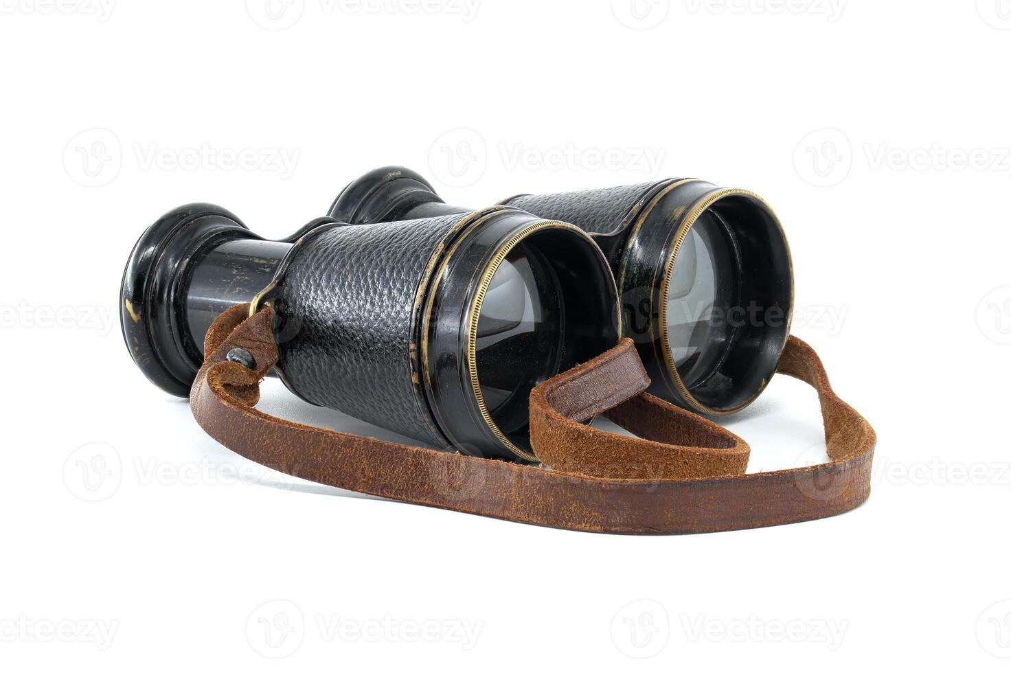 Binoculars with brown leather straps isolated on white photo