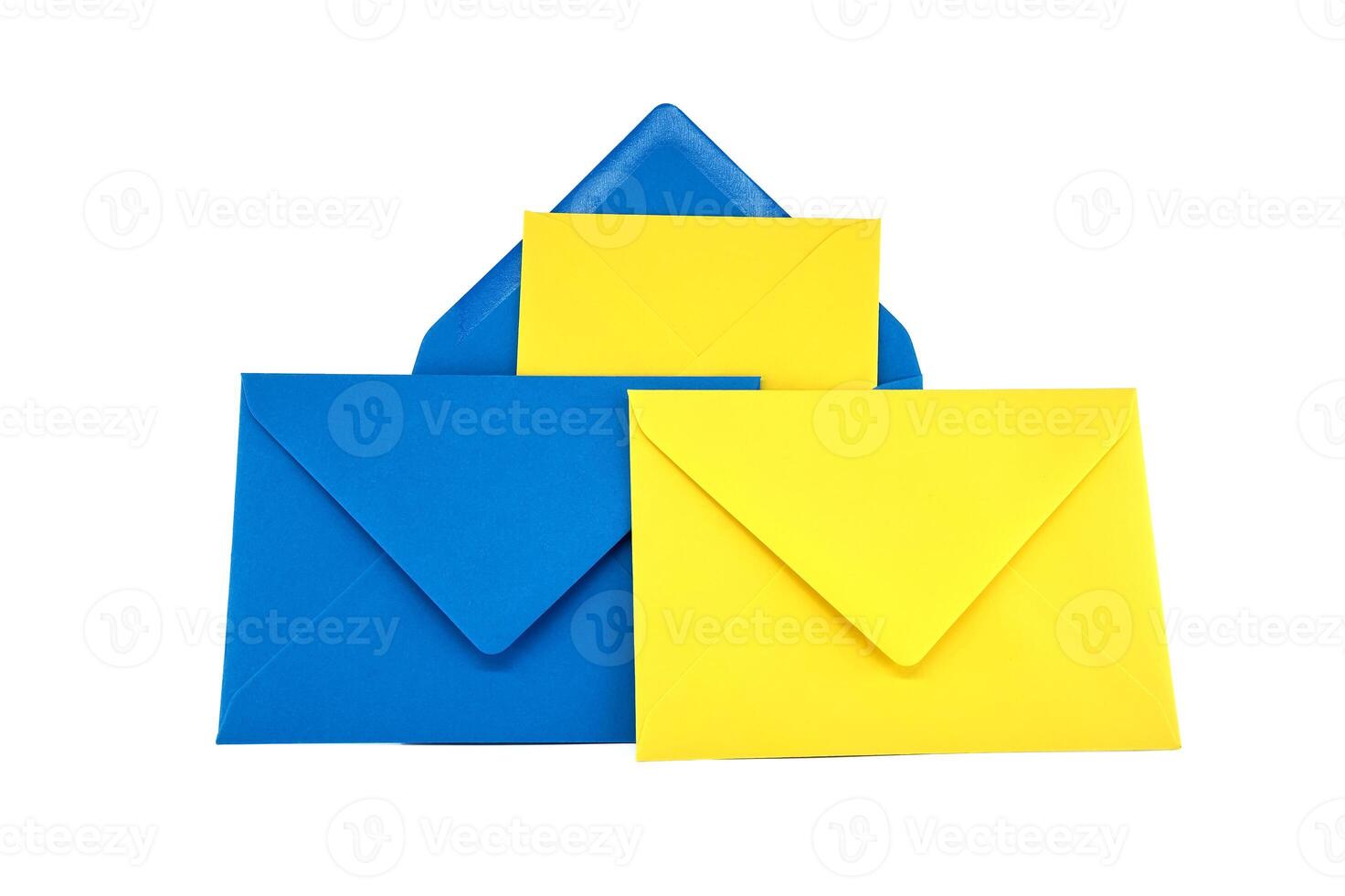 Blue and yellow paper envelopes arranged overt white photo