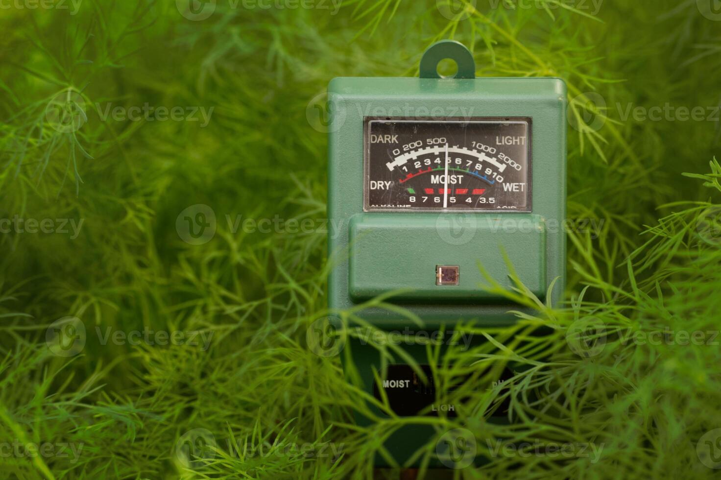 Measure soil with three way digital device photo