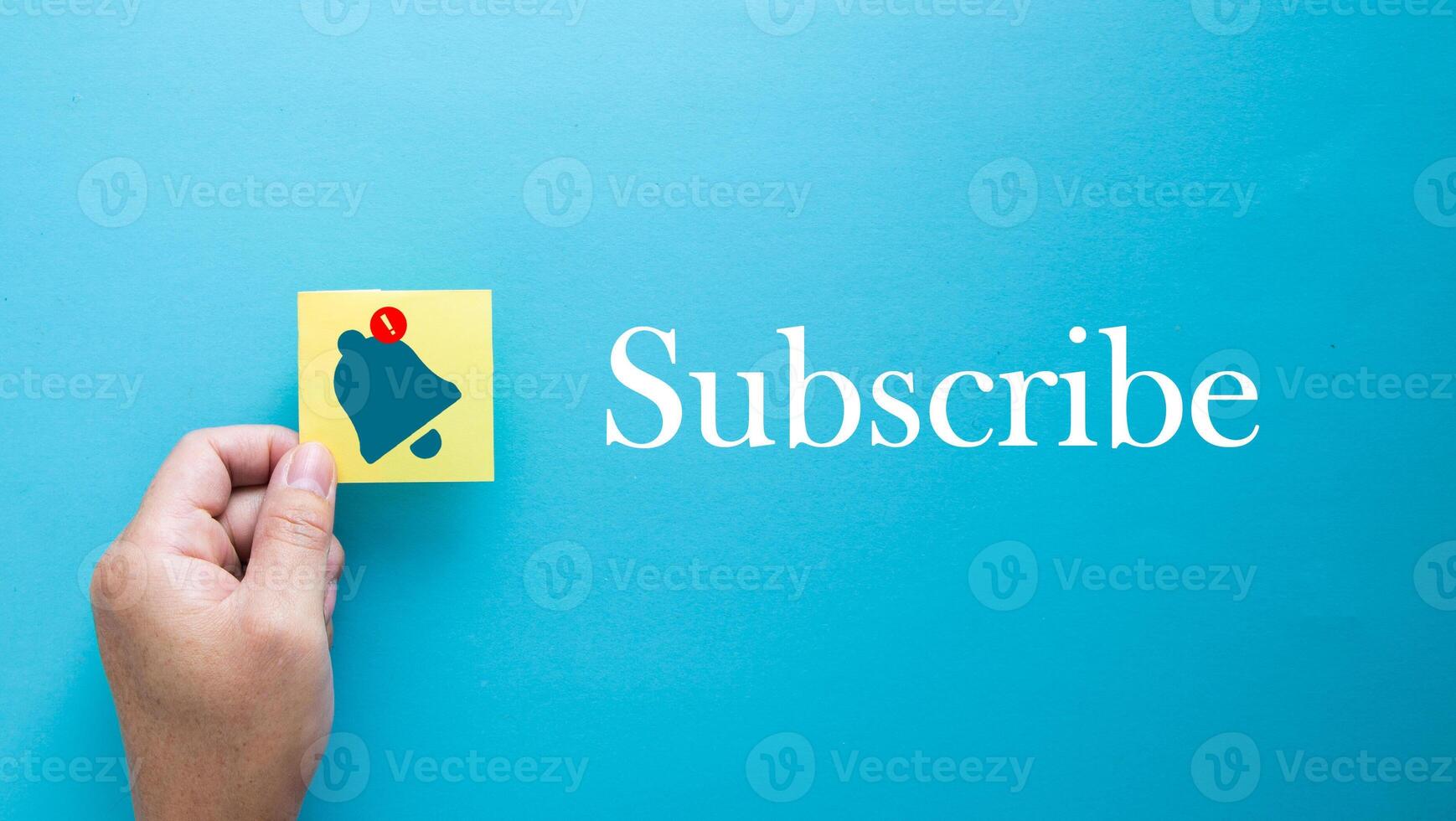 Paper with drawings of a bell and the inscription - subscription photo
