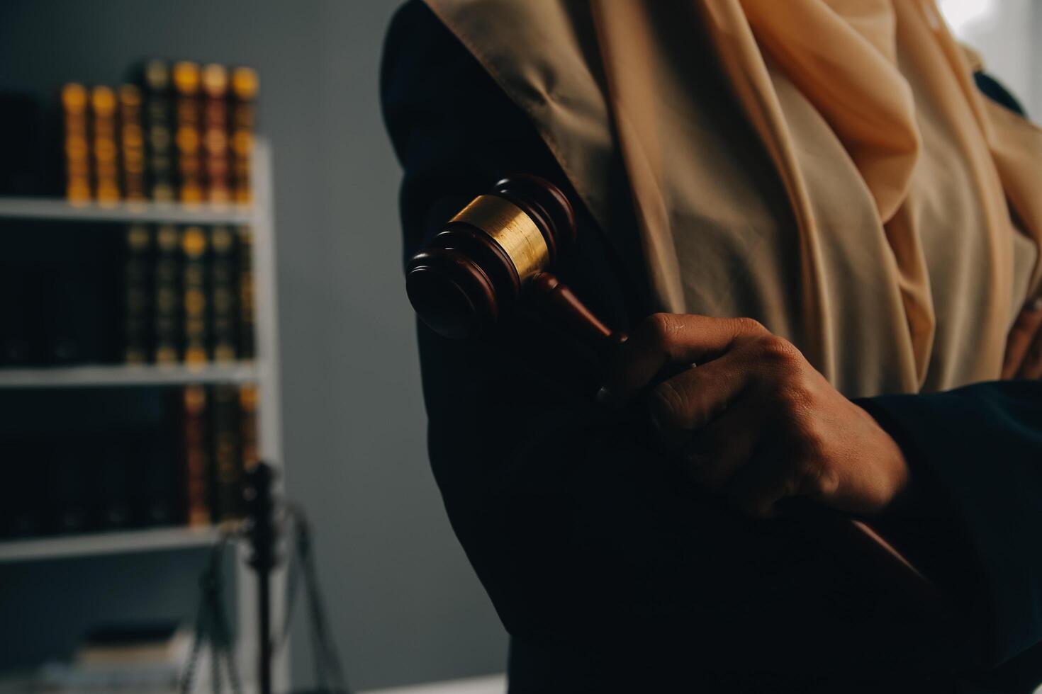 Business and lawyers discussing contract papers with brass scale on desk in office. Law, legal services, advice, justice and law concept picture with film grain effect photo