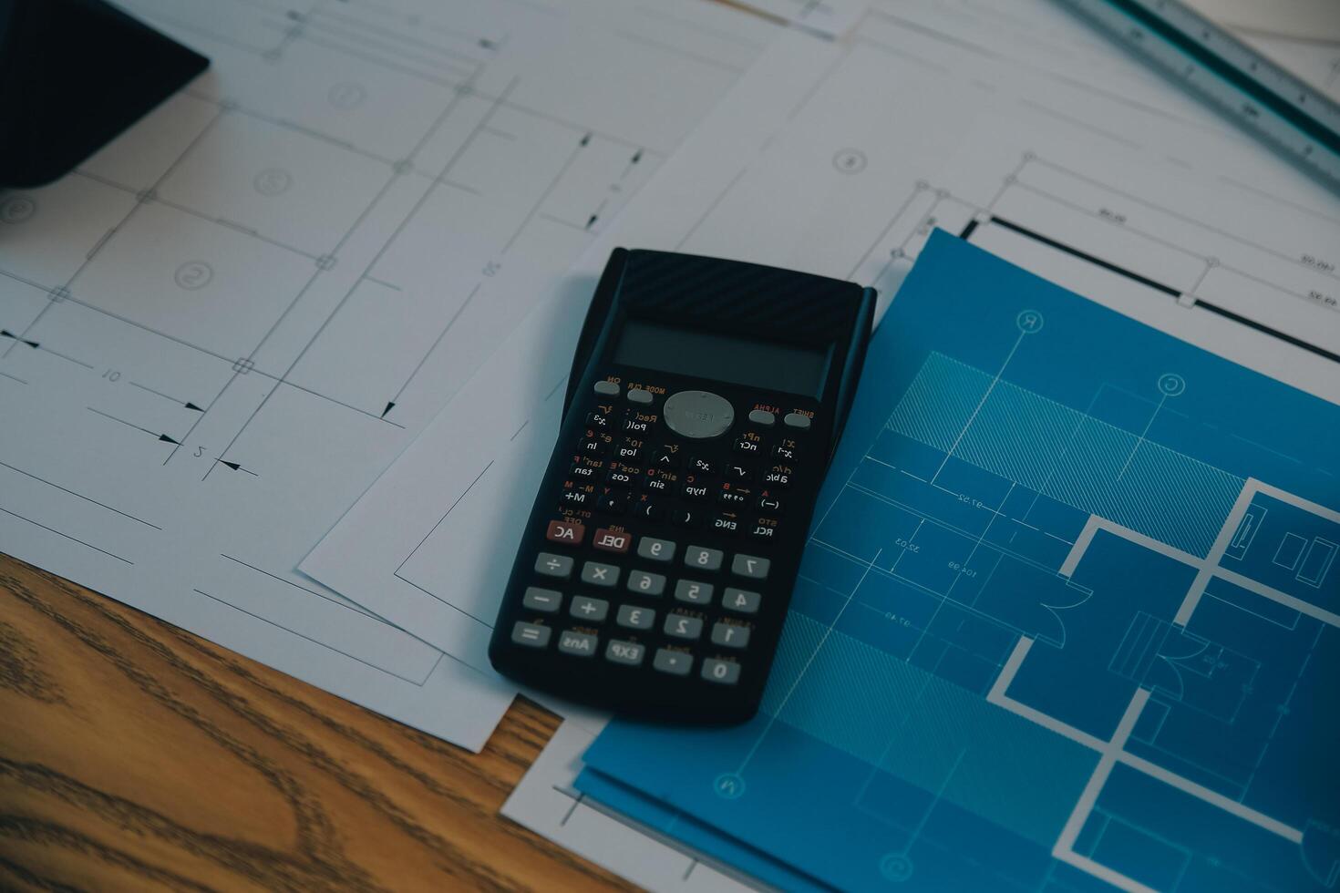 Construction and structure concept of Engineer or architect meeting for project working with partner and engineering tools on model building and blueprint in working site, contract for both companies. photo