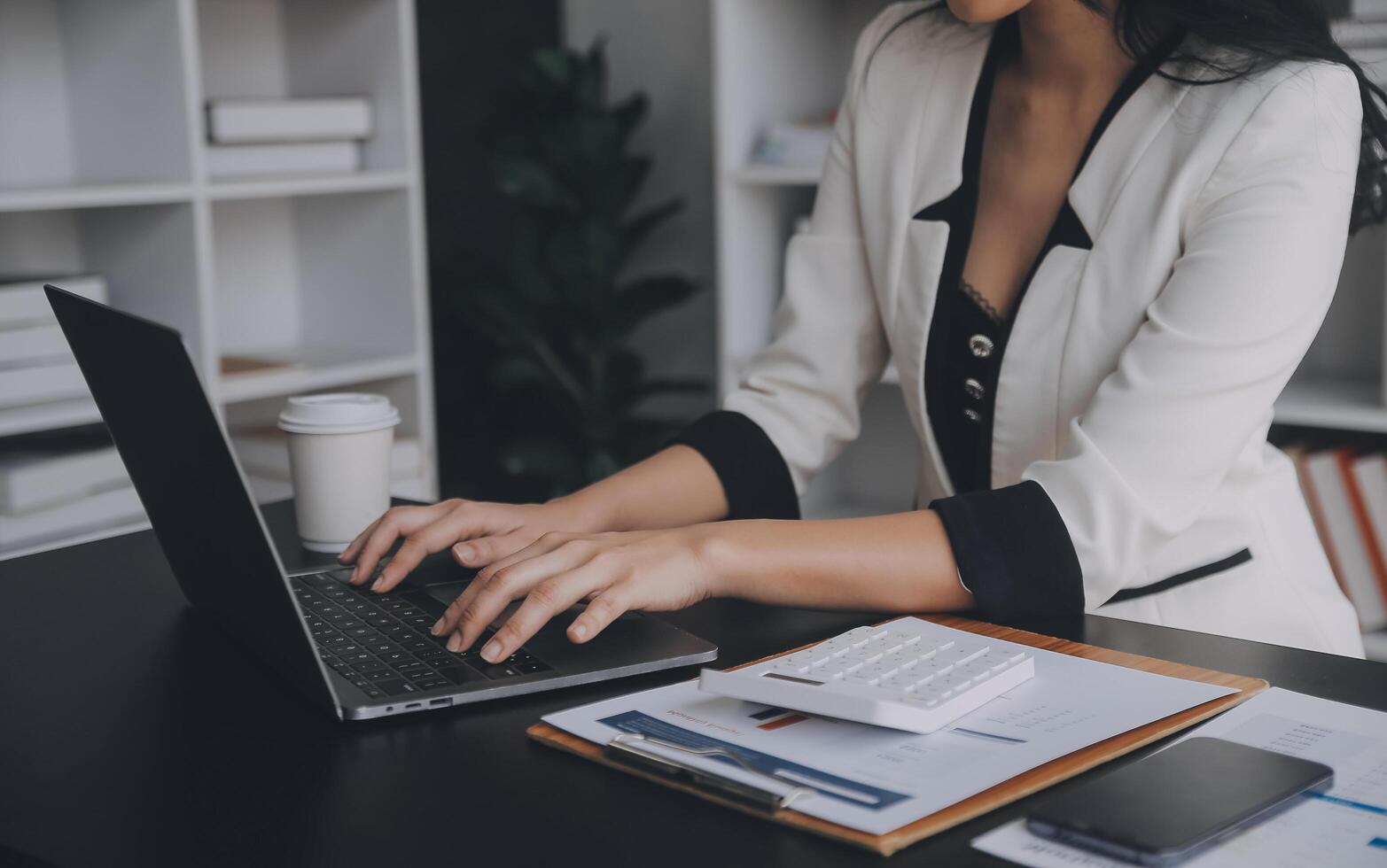 Audit concept,Administrator business man financial inspector and secretary making report calculating balance. Internal Revenue Service checking document. photo