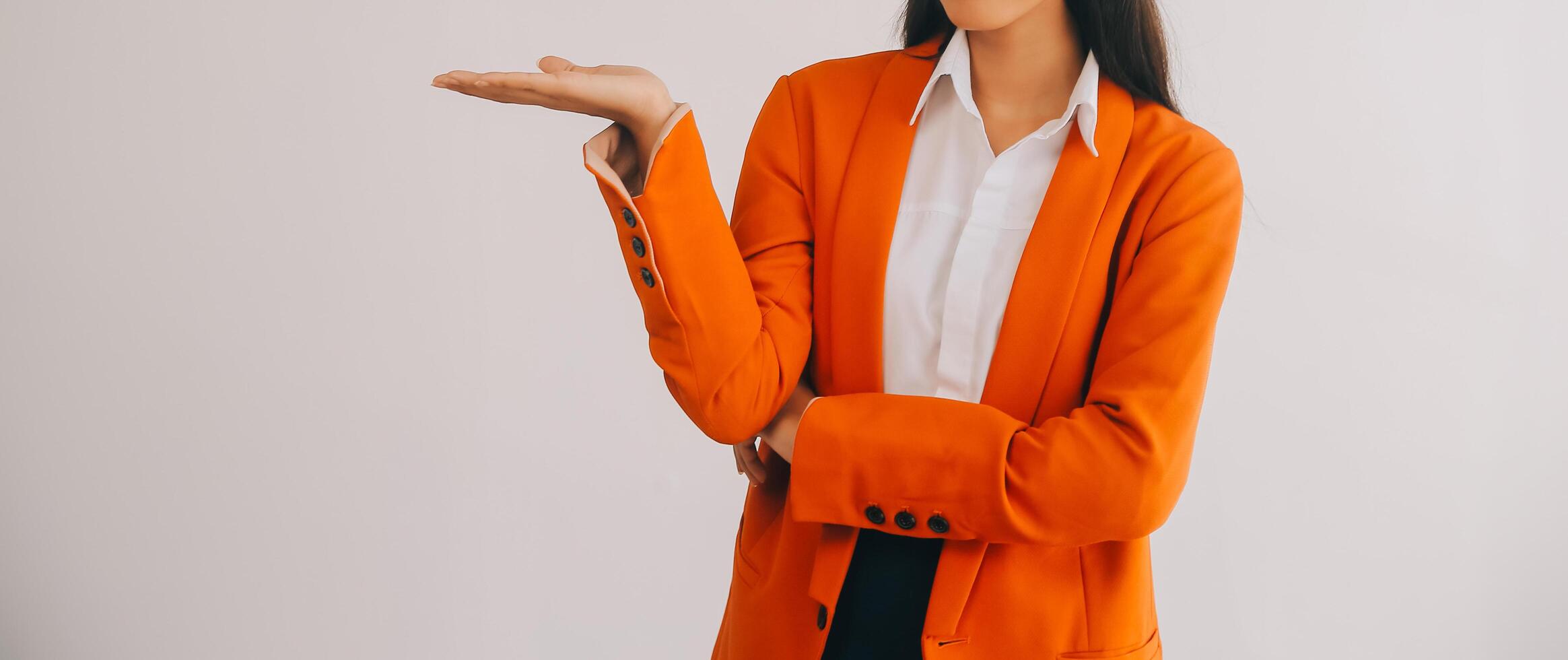 Asian Business woman using calculator and laptop for doing math finance on an office desk, tax, report, accounting, statistics, and analytical research concept photo