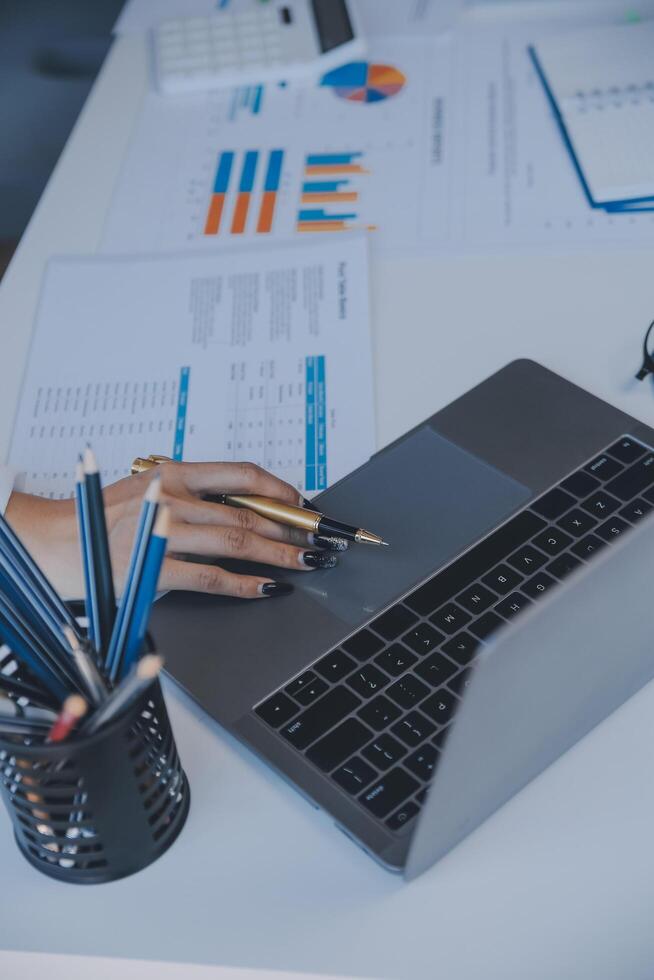 Business team collaboration discussing working analyzing with financial data and marketing growth report graph in team, presentation and brainstorming to strategy planning making profit of company. photo