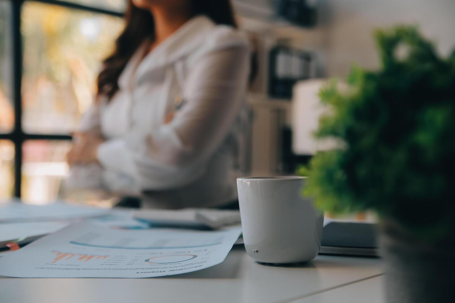 Business team collaboration discussing working analyzing with financial data and marketing growth report graph in team, presentation and brainstorming to strategy planning making profit of company. photo
