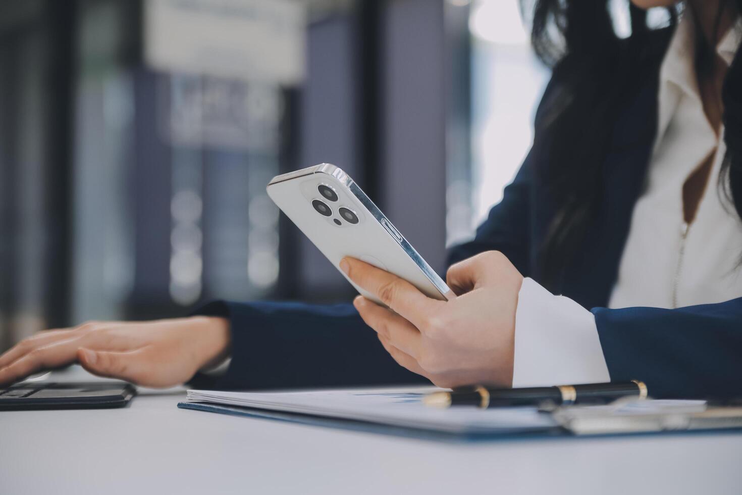 Financial analysts analyze business financial reports on a digital tablet planning investment project during a discussion at a meeting of corporate showing the results of their successful teamwork. photo