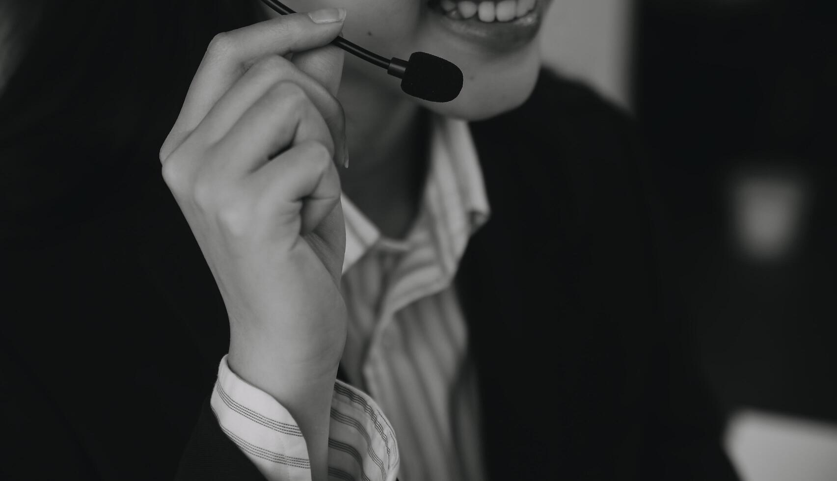 Communication support, call center and customer service help desk. VOIP headset on telephone keyboard. photo