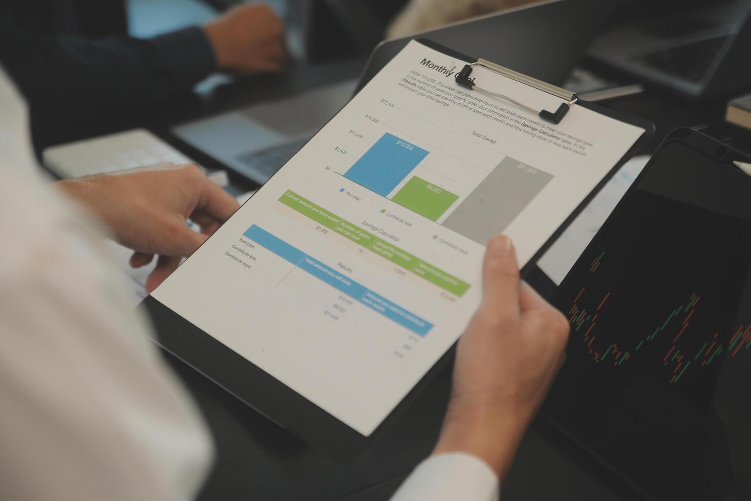 Business team collaboration discussing working analyzing with financial data and marketing growth report graph in team, presentation and brainstorming to strategy planning making profit of company. photo