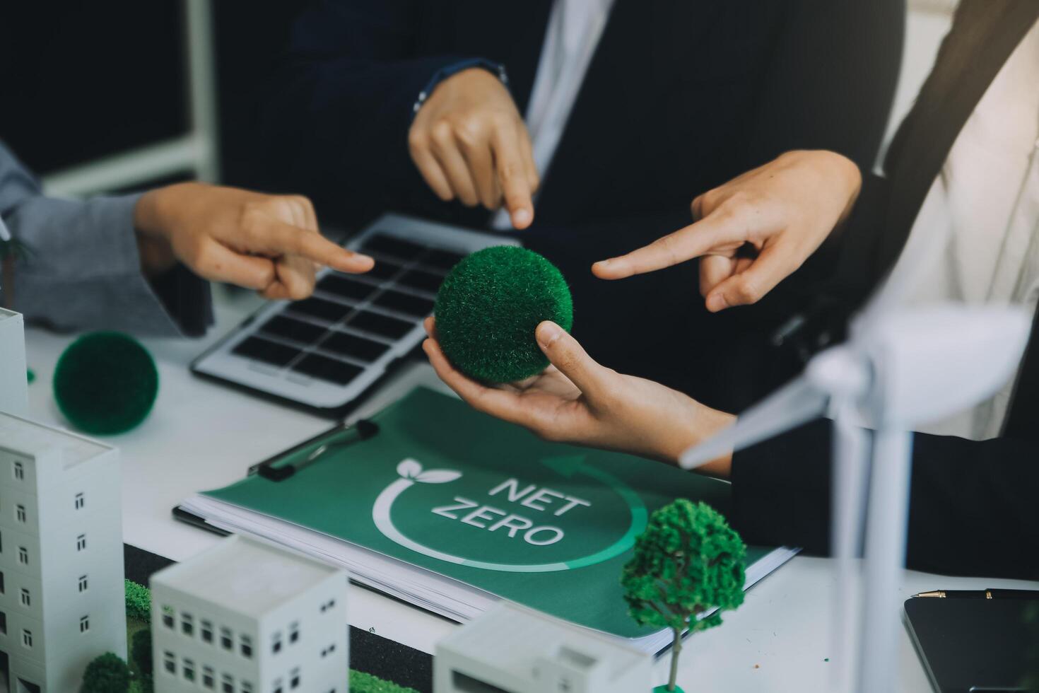 Carbon offset price report CO2 emission. Future growth Net zero waste in ESG ethical SME office protect climate change global warming social issues project. Group of asia people Eco friendly SDGs plan photo